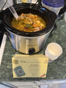 italian wedding soup from the recipe in the book The Wedding Soup Murder ready for the book club soup swap